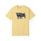 Yellow t-shirt with black and white cow graphic and text 'thank a farmer' on a white background